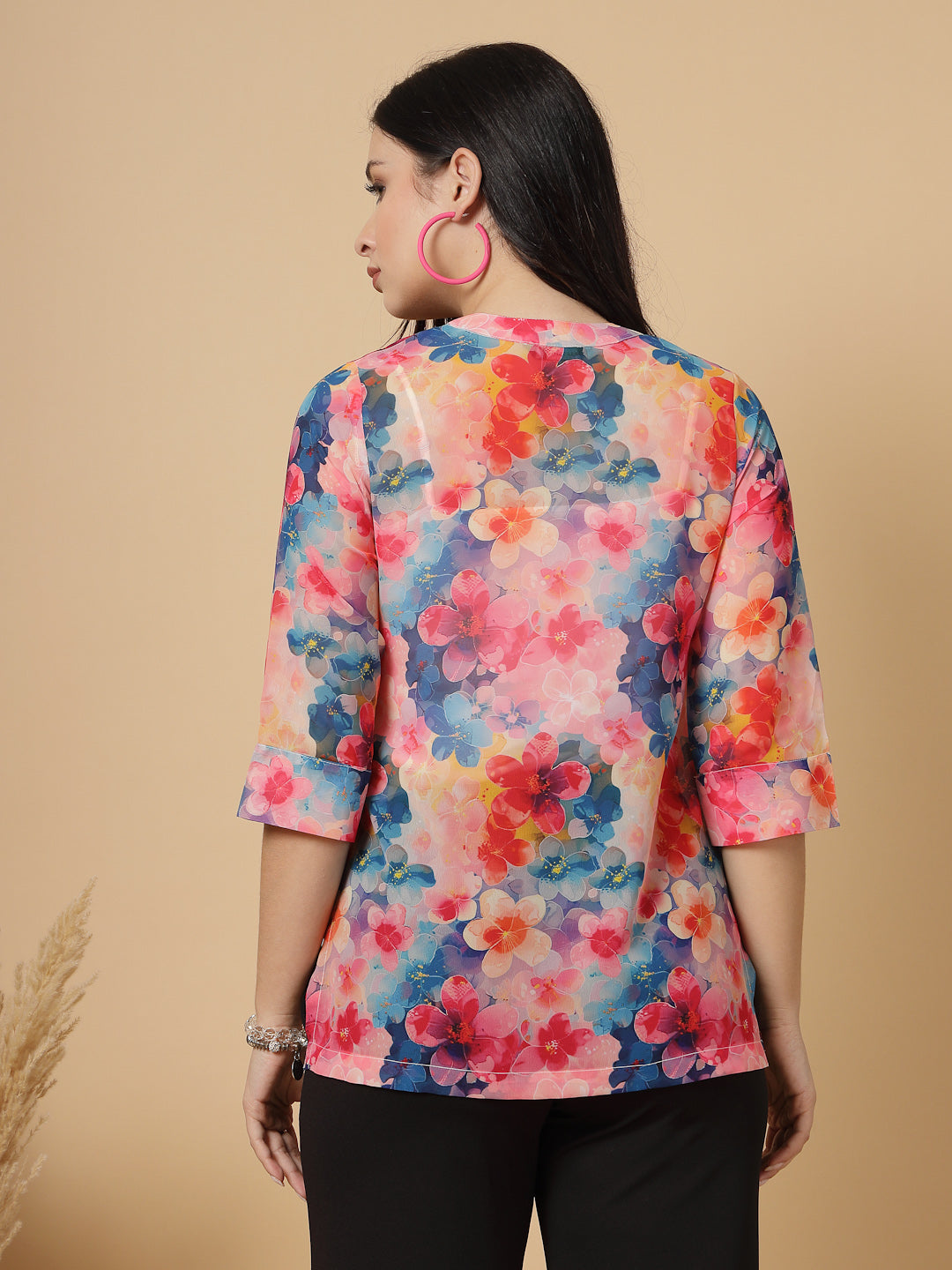 A modern take on a classic. This hip-length Printed kurta top offers a band collar, button-front, and a breezy, loose silhouette. Perfect, for office &amp; casual outings.

Dress it up or down for any occasion.
