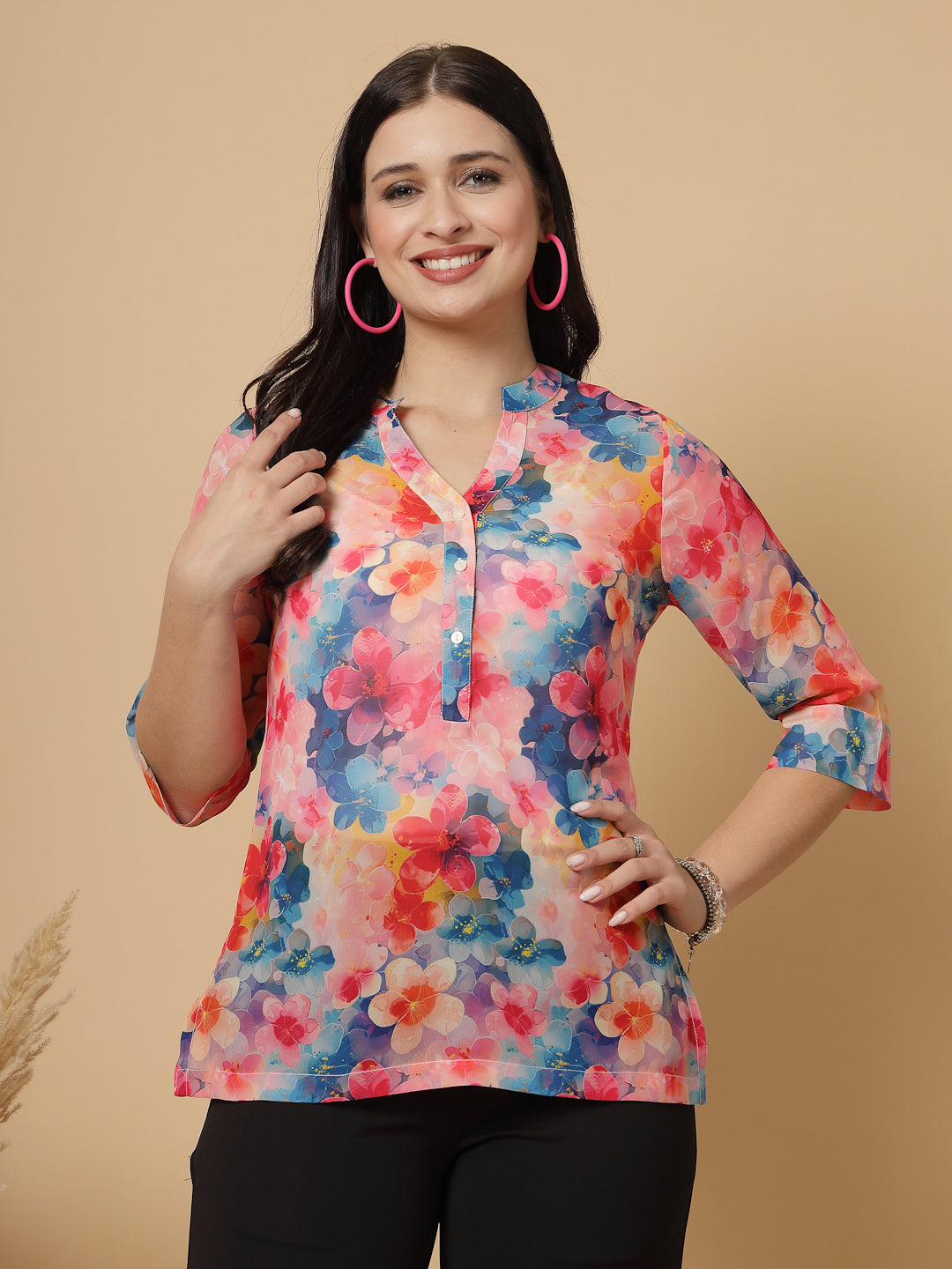 A modern take on a classic. This hip-length Printed kurta top offers a band collar, button-front, and a breezy, loose silhouette. Perfect, for office &amp; casual outings.

Dress it up or down for any occasion.
