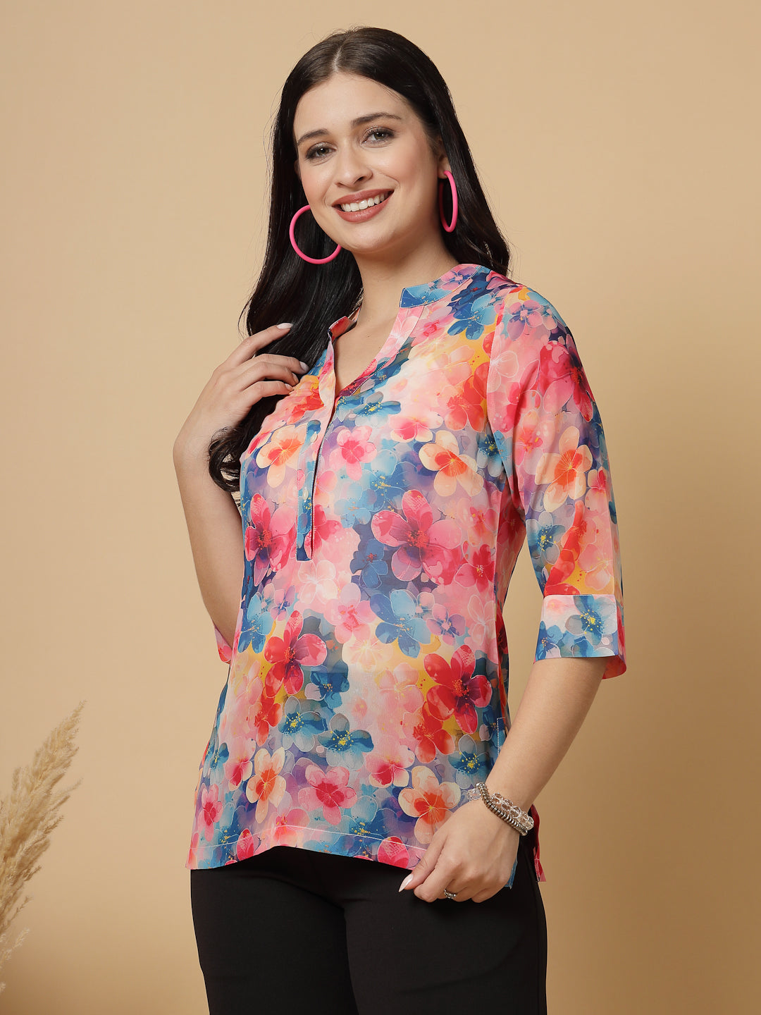 A modern take on a classic. This hip-length Printed kurta top offers a band collar, button-front, and a breezy, loose silhouette. Perfect, for office &amp; casual outings.

Dress it up or down for any occasion.
