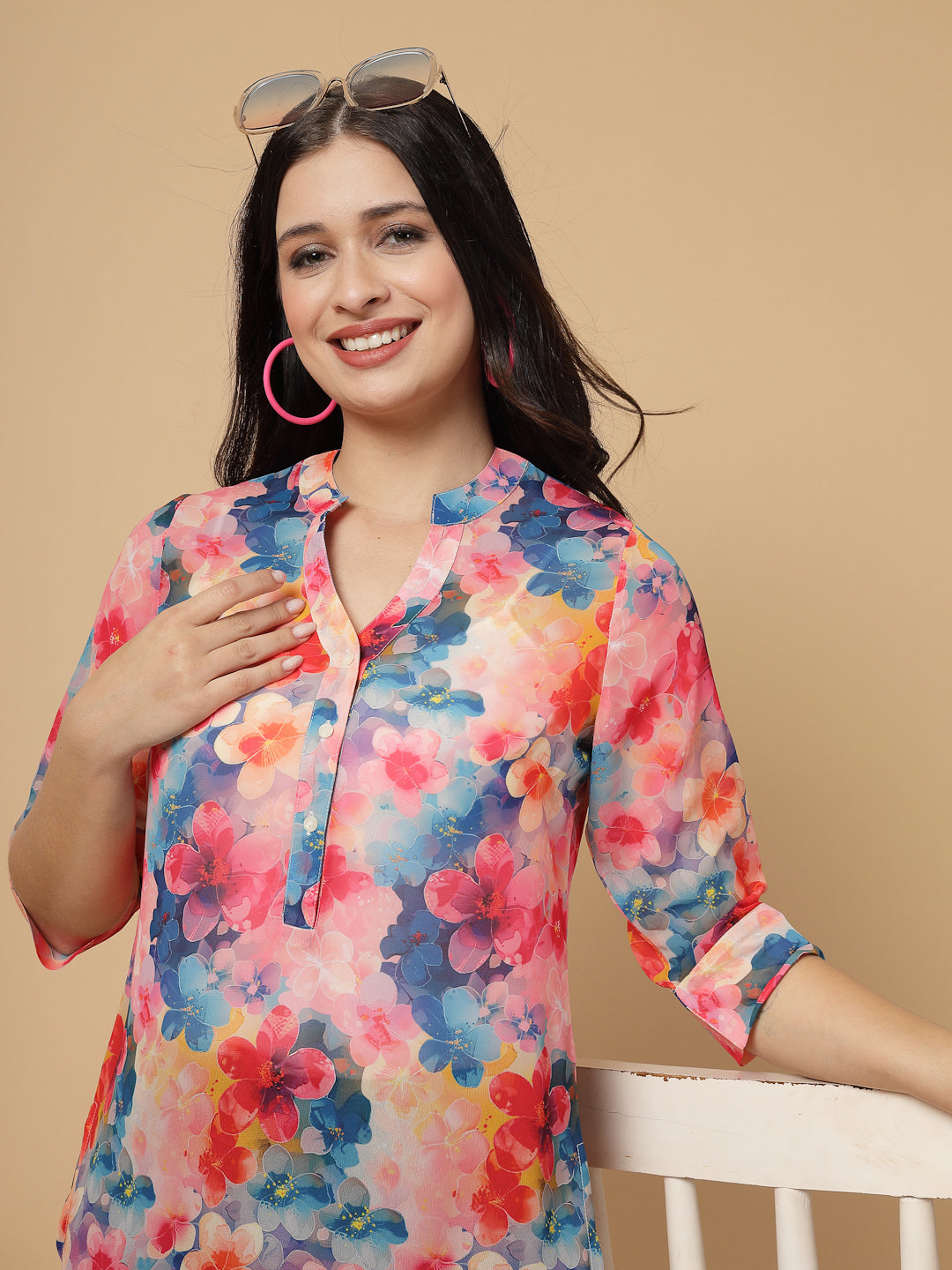 A modern take on a classic. This hip-length Printed kurta top offers a band collar, button-front, and a breezy, loose silhouette. Perfect, for office &amp; casual outings.

Dress it up or down for any occasion.
