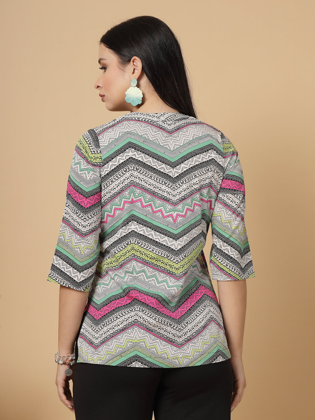 A modern take on a classic. This hip-length Printed kurta top offers a band collar, button-front, and a breezy, loose silhouette. Perfect, for office &amp; casual outings.

Dress it up or down for any occasion.
