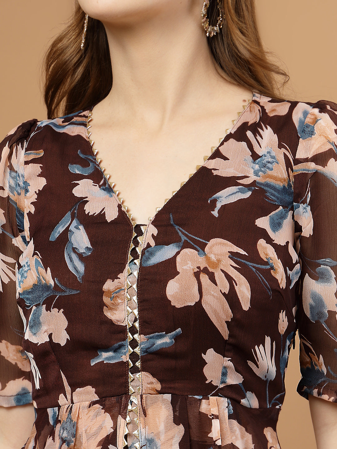 Brown and beige floral print party wear long kurti set with flared pants, cotton lining in palazzo and kurti body, double-layer chiffon flare for elegant flowy look.