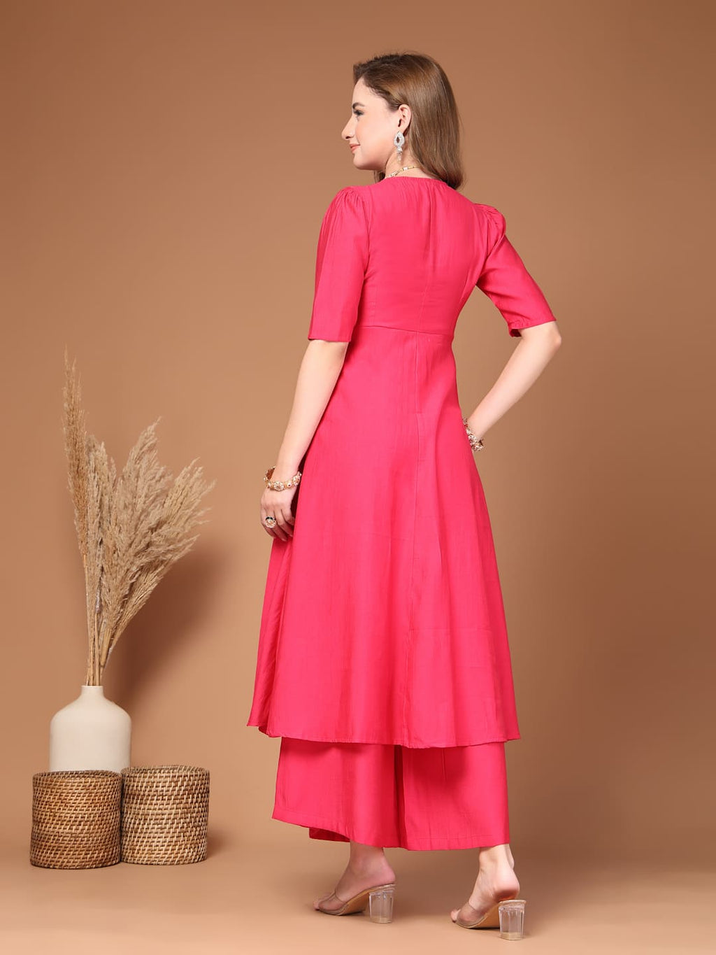 Pink colour layered kurta set featuring flared pants, comfortable and graceful women’s ethnic wear