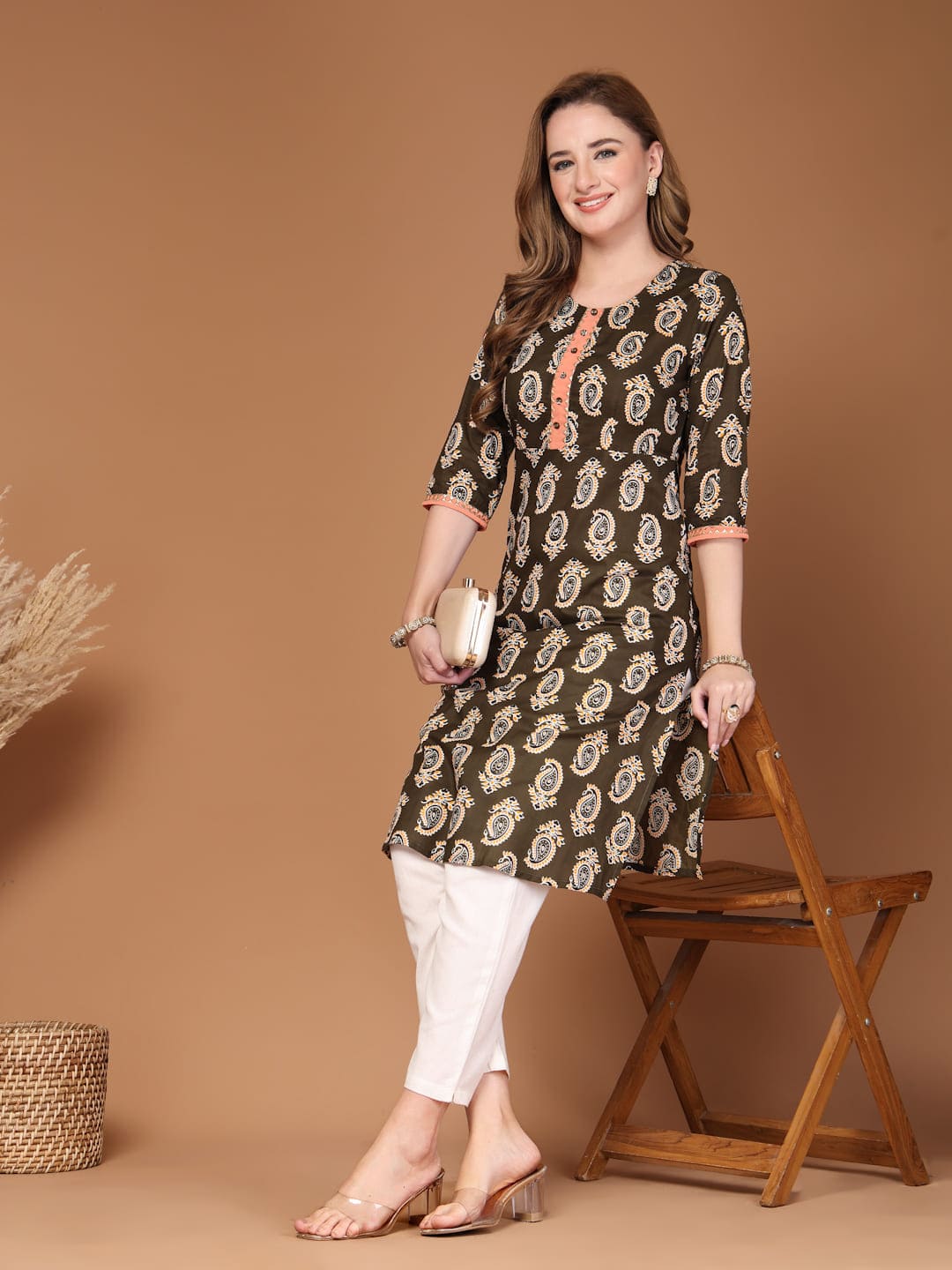 Women wearing paisley print office wear kurti