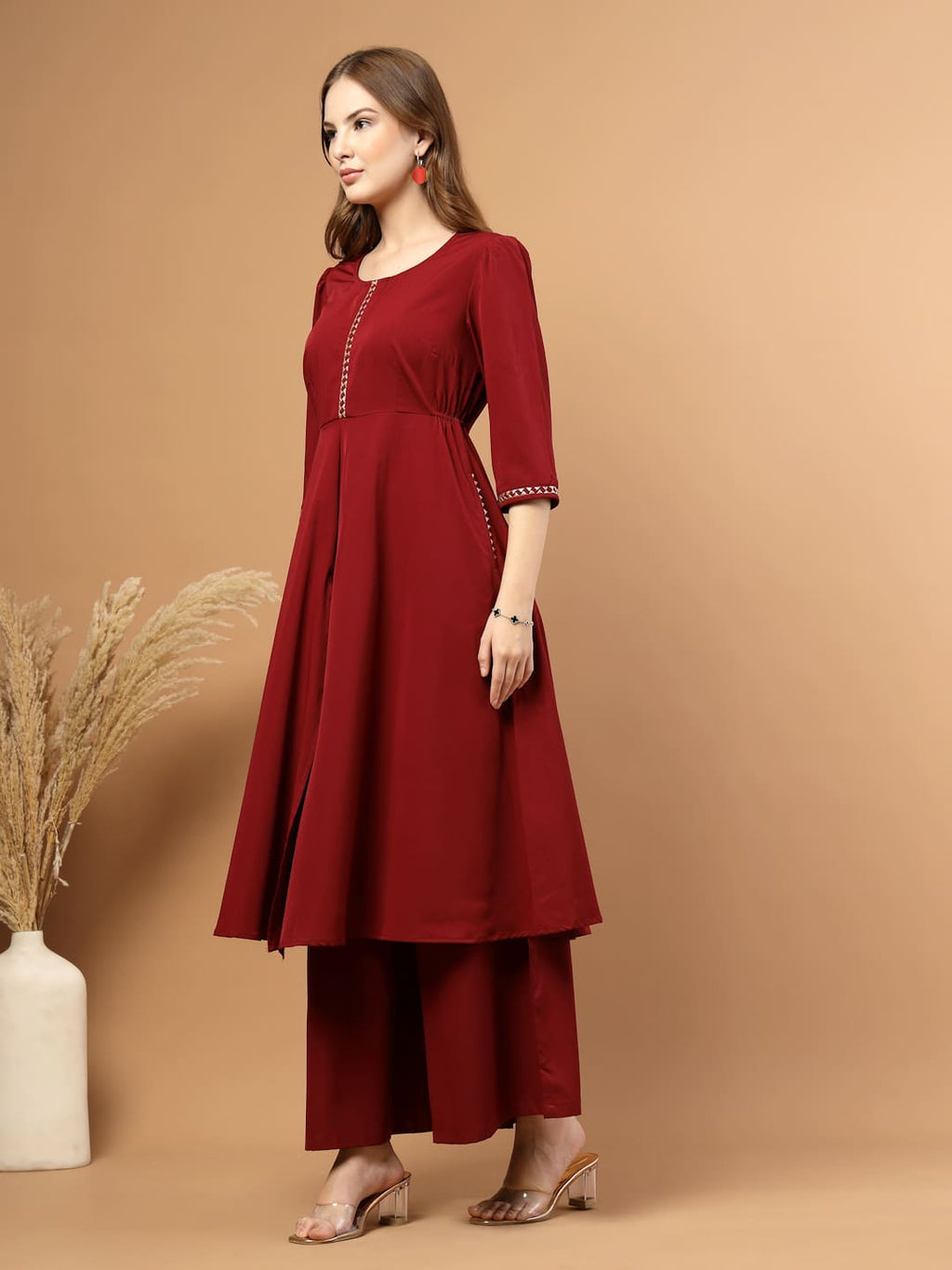 Solid Burgundy Kurta Set for Women with Gotta Patti Lace, Circular Flare Kurta with Front Slit and Flared Pants- left side view