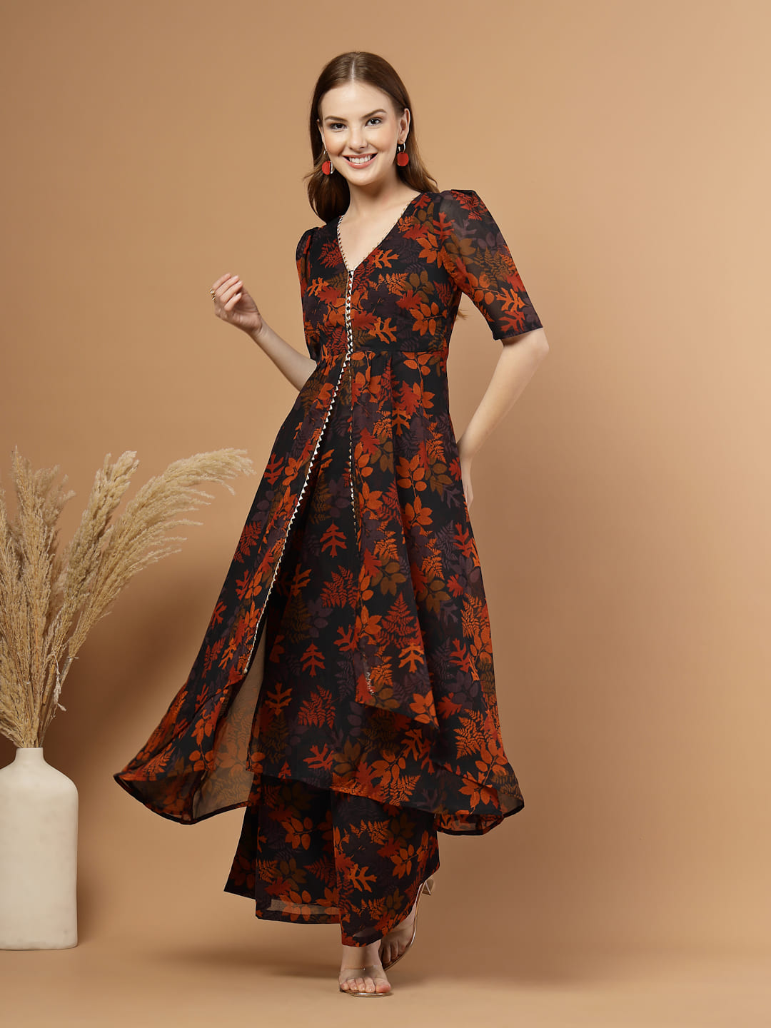 Tropical printed layered kurta set with flared pants for women – festive wear with lace detailing, side zip, lining, and pocket.