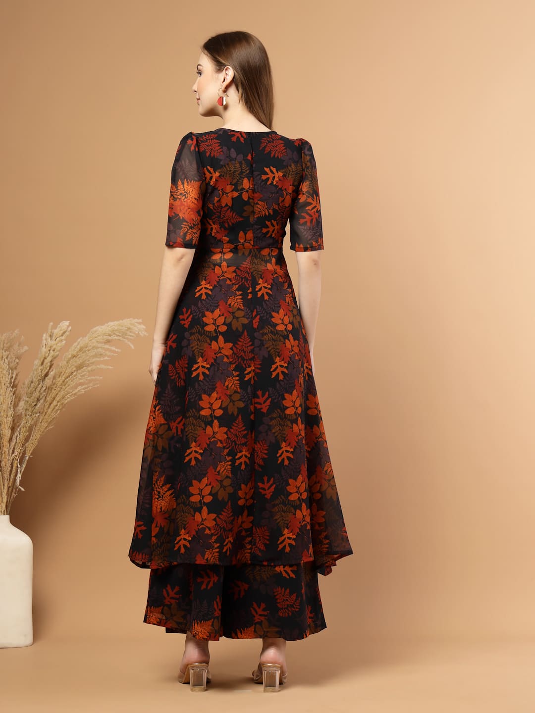 Tropical printed layered kurta set with flared pants for women – festive wear with lace detailing, side zip, lining, and pocket back view.