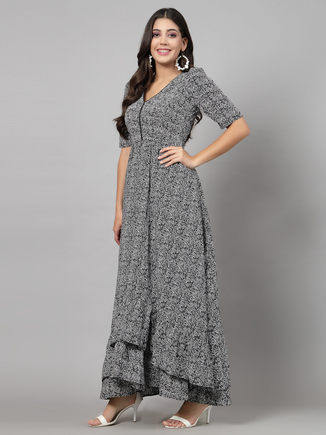 Printed Dress in for women & girls Crepe.  Tailored With Short Sleeve & 'V' Neck, has a high low double layer pattern at front.  Finished with a zip Closure at back for easy slip in.