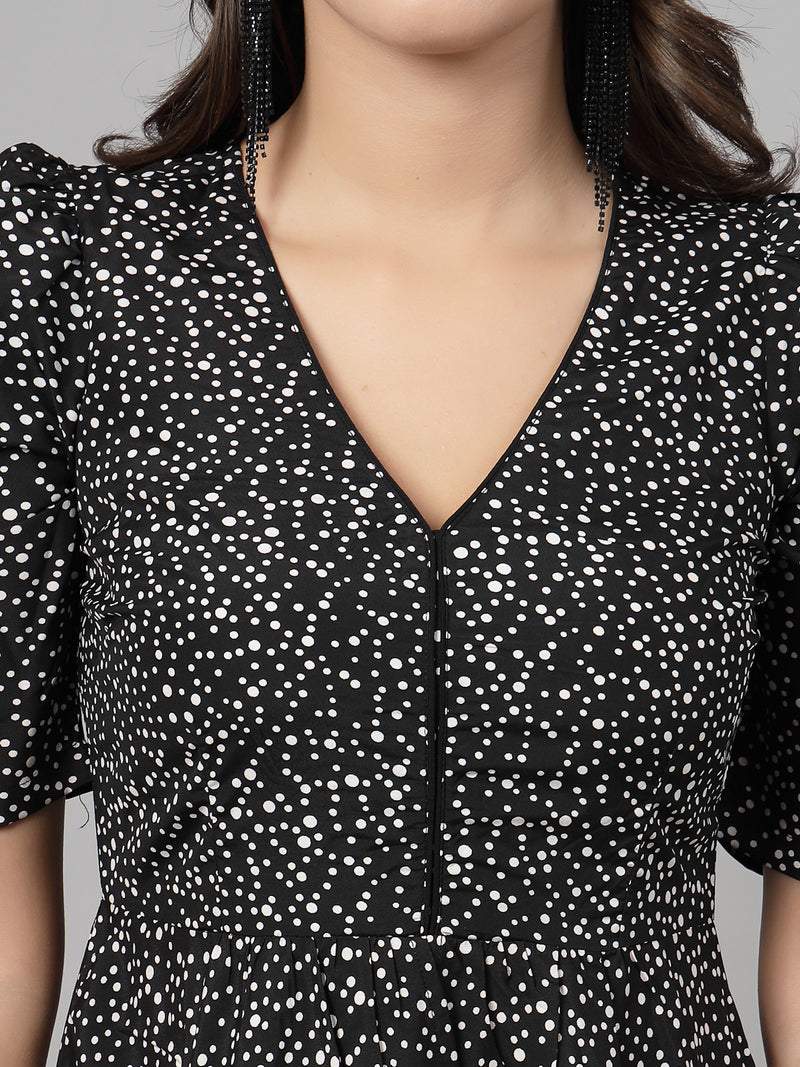 Black dot Printed Dress for women & girls Crepe.  Tailored With Short Sleeve & 'V' Neck, has a high low double layer pattern at front.  Finished with a zip Closure at back for easy slip in.