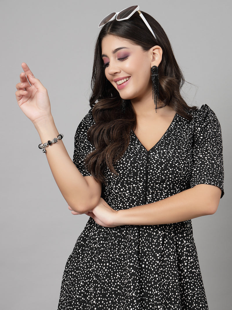 Black dot Printed Dress for women & girls Crepe.  Tailored With Short Sleeve & 'V' Neck, has a high low double layer pattern at front.  Finished with a zip Closure at back for easy slip in.