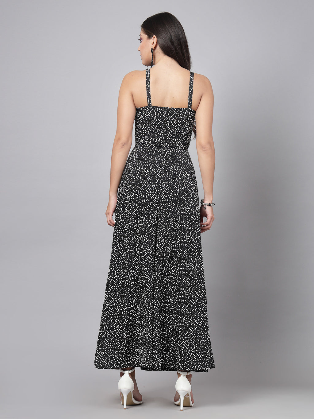 This stunning and playful tiny polka print jumpsuit for women & girls with a stylish cut at the waist is what your wardrobe just needs ! Complete your look with a pair of heels and a sling.   Colour : Black  Print : Tiny Polka Print  Material : Crepe  Sleeve : Sleeveless  Zip Closure at Back   