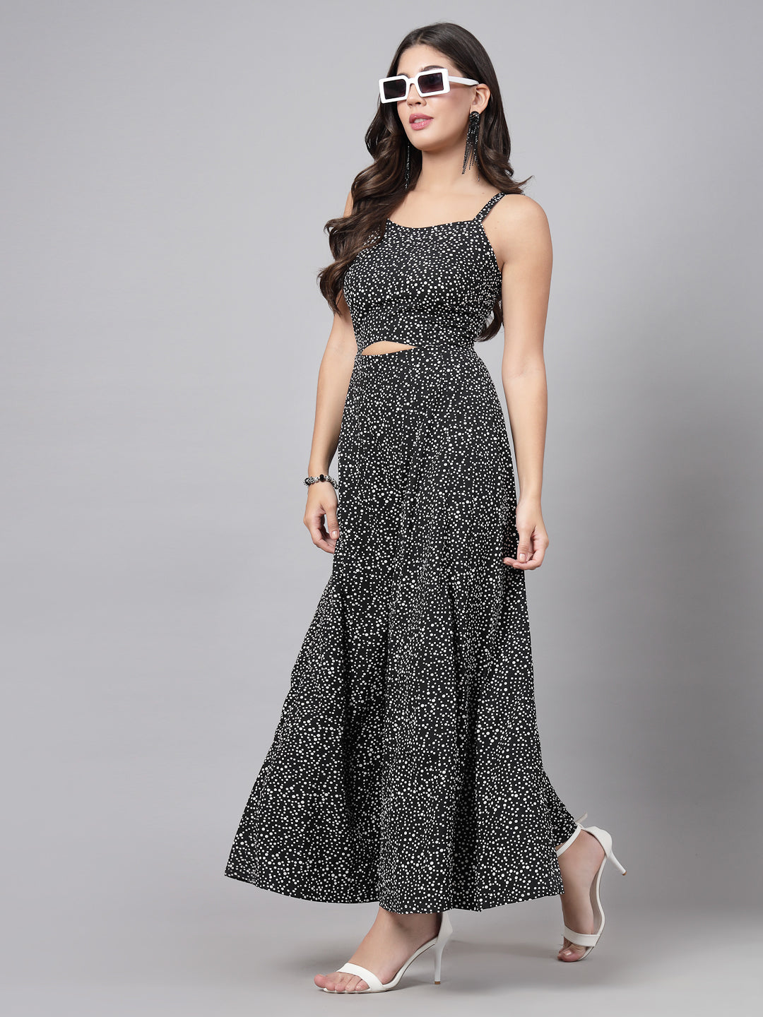 This stunning and playful tiny polka print jumpsuit for women & girls with a stylish cut at the waist is what your wardrobe just needs ! Complete your look with a pair of heels and a sling.   Colour : Black  Print : Tiny Polka Print  Material : Crepe  Sleeve : Sleeveless  Zip Closure at Back