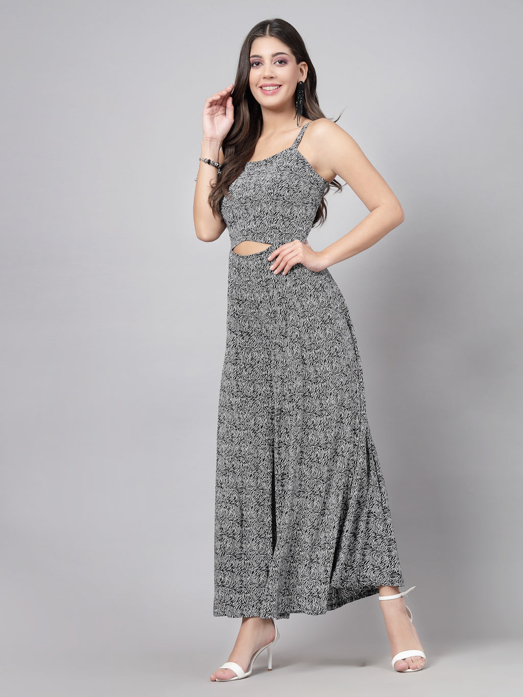     This stunning and playful black print jumpsuit for women & girls with a stylish cut at the waist is what your wardrobe just needs ! Complete your look with a pair of heels and a sling.   Colour : Black  Print : All over Print  Material : Crepe  Sleeve : Sleeveless  Zip Closure at Back   