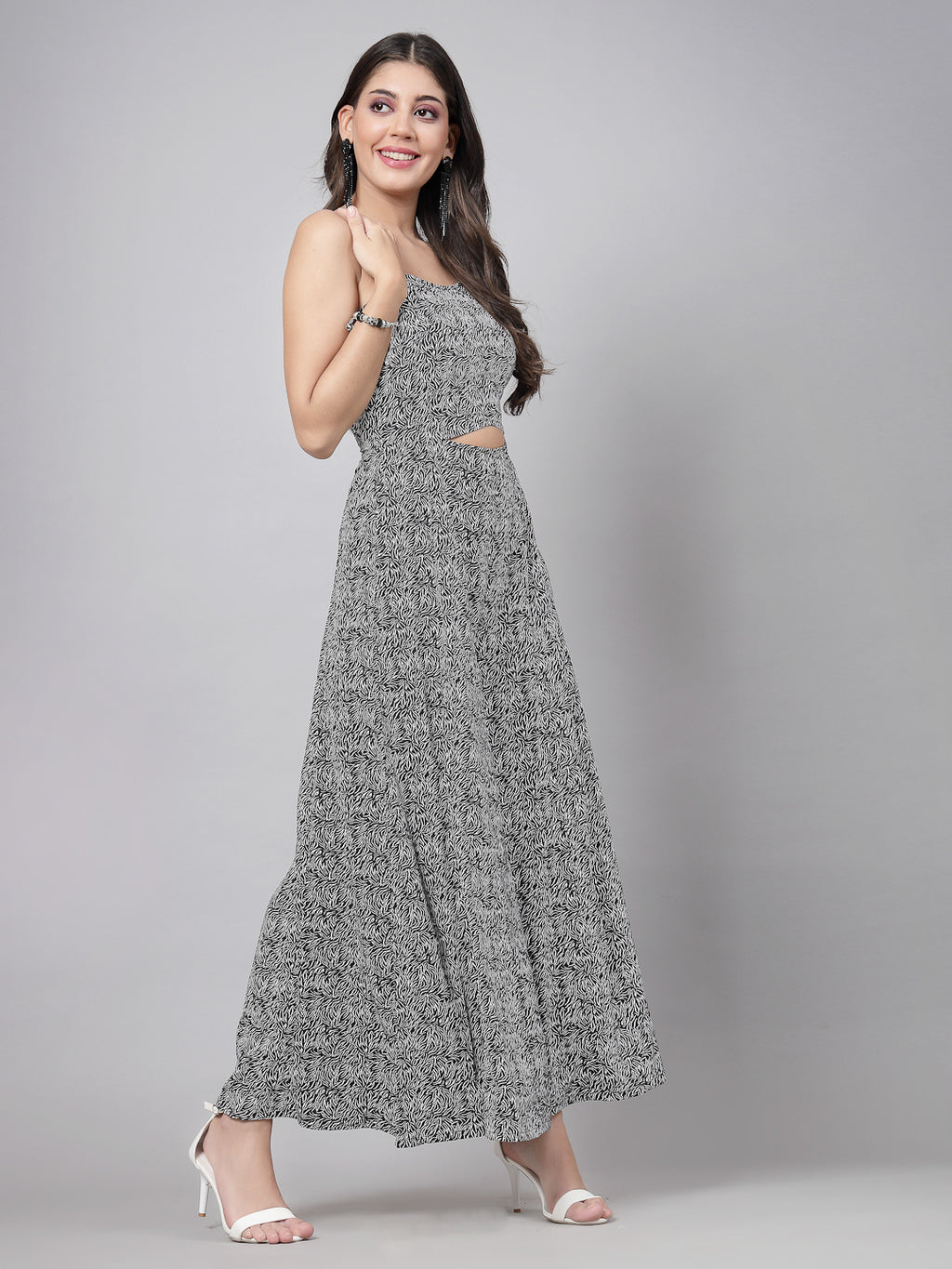     This stunning and playful black print jumpsuit for women & girls with a stylish cut at the waist is what your wardrobe just needs ! Complete your look with a pair of heels and a sling.   Colour : Black  Print : All over Print  Material : Crepe  Sleeve : Sleeveless  Zip Closure at Back   