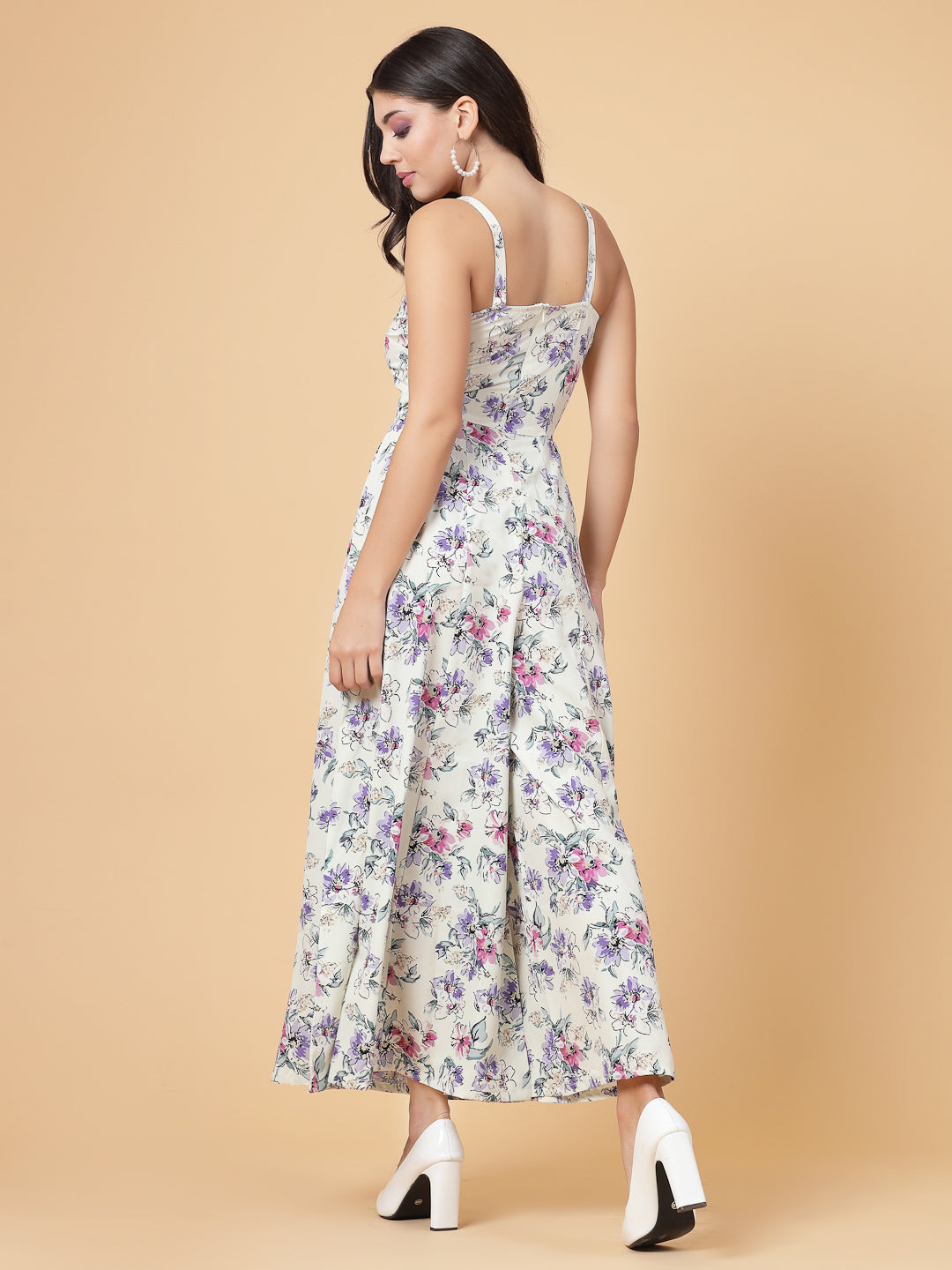 This stunning and playful floral print jumpsuit for women & girls with a stylish cut at the waist is what your wardrobe just needs ! Complete your look with a pair of heels and a sling.   Colour : Multi   Print : Floral Print  Material : Crepe  Sleeve : Sleeveless  Zip Closure at Back