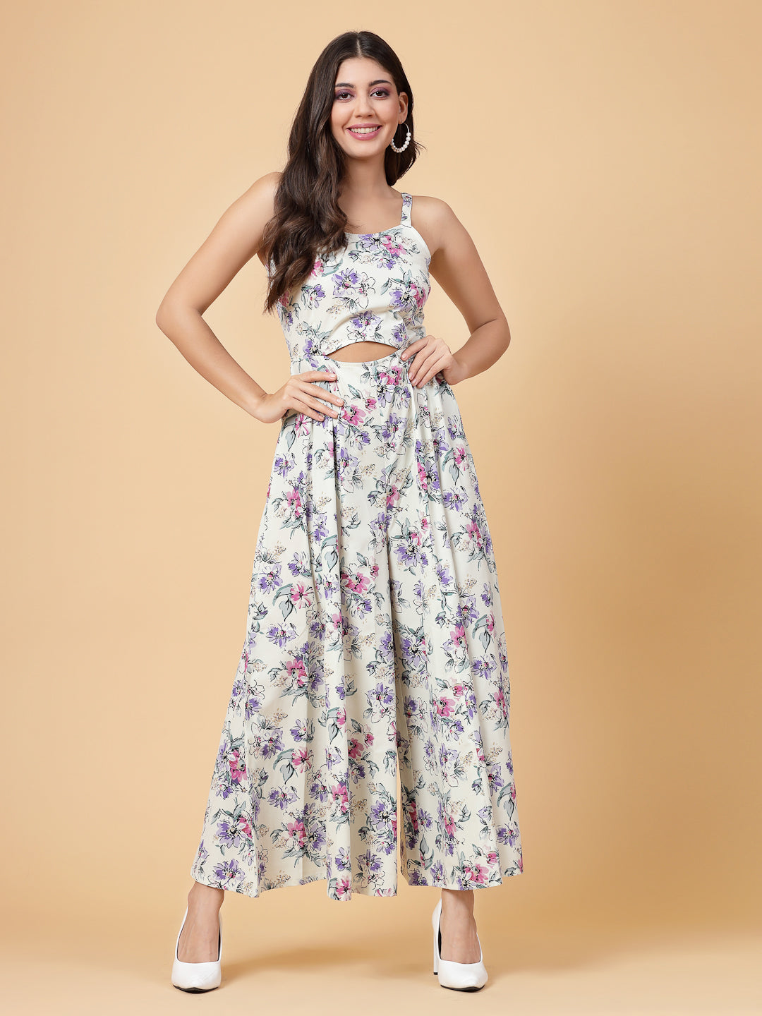 This stunning and playful floral print jumpsuit for women & girls with a stylish cut at the waist is what your wardrobe just needs ! Complete your look with a pair of heels and a sling.   Colour : Multi   Print : Floral Print  Material : Crepe  Sleeve : Sleeveless  Zip Closure at Back