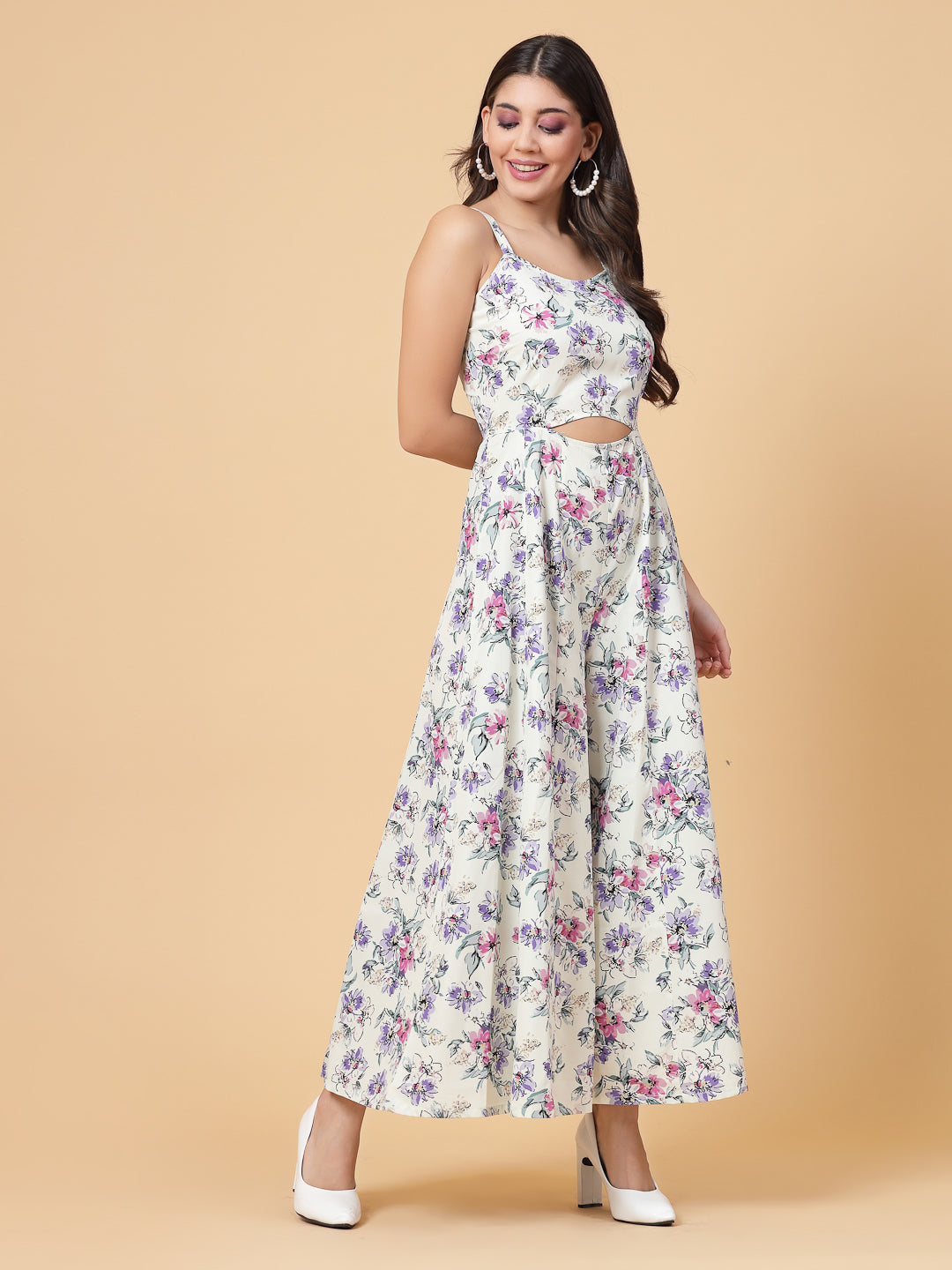 This stunning and playful floral print jumpsuit for women & girls with a stylish cut at the waist is what your wardrobe just needs ! Complete your look with a pair of heels and a sling.   Colour : Multi   Print : Floral Print  Material : Crepe  Sleeve : Sleeveless  Zip Closure at Back