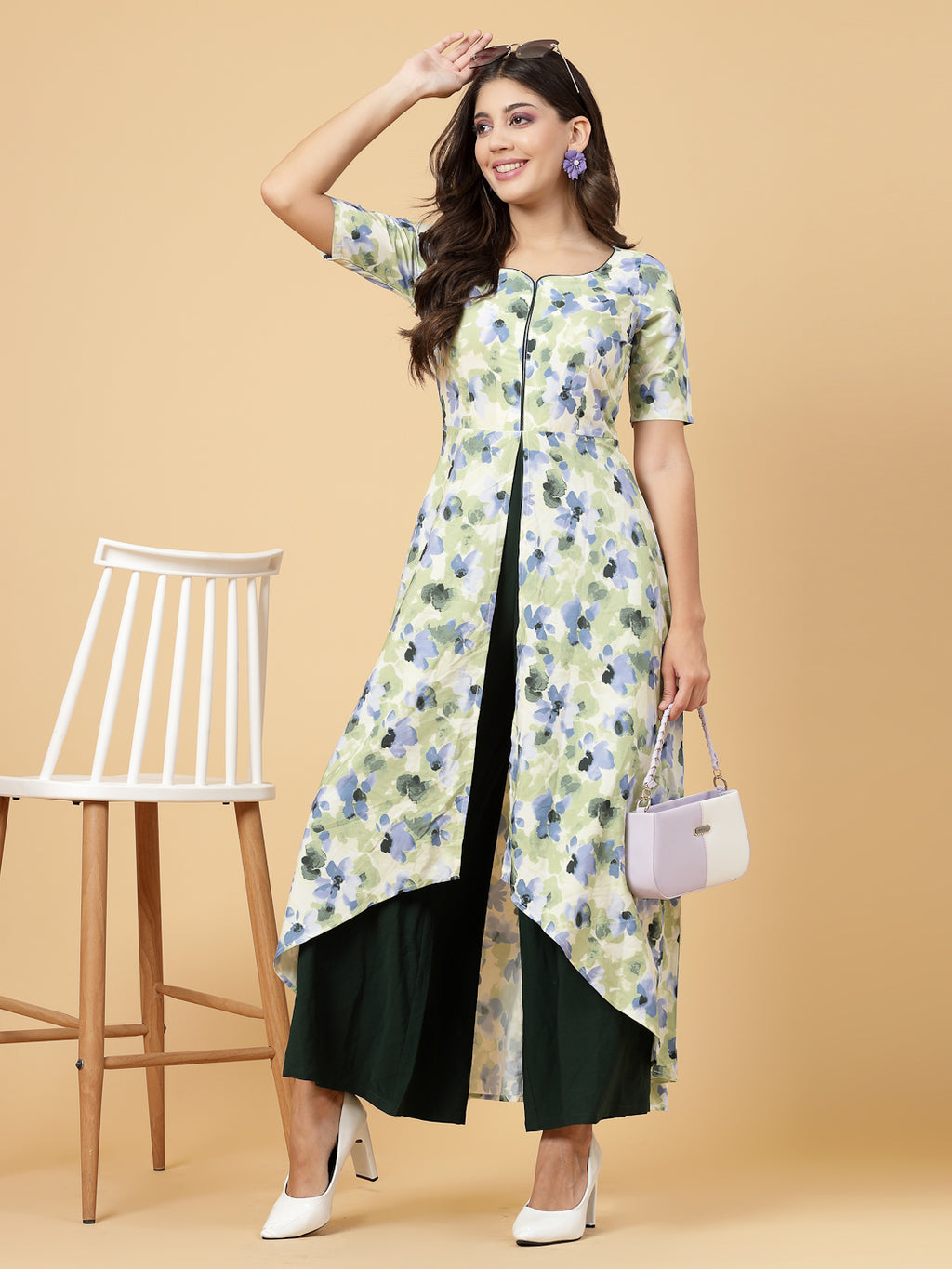 Make a stylish statement by this all time favourite jumpsuit for women, whether its official meetings or family gatherings, this will surly turn heads.  Zip Closure at Back | Fabric Crepe | Lining attached