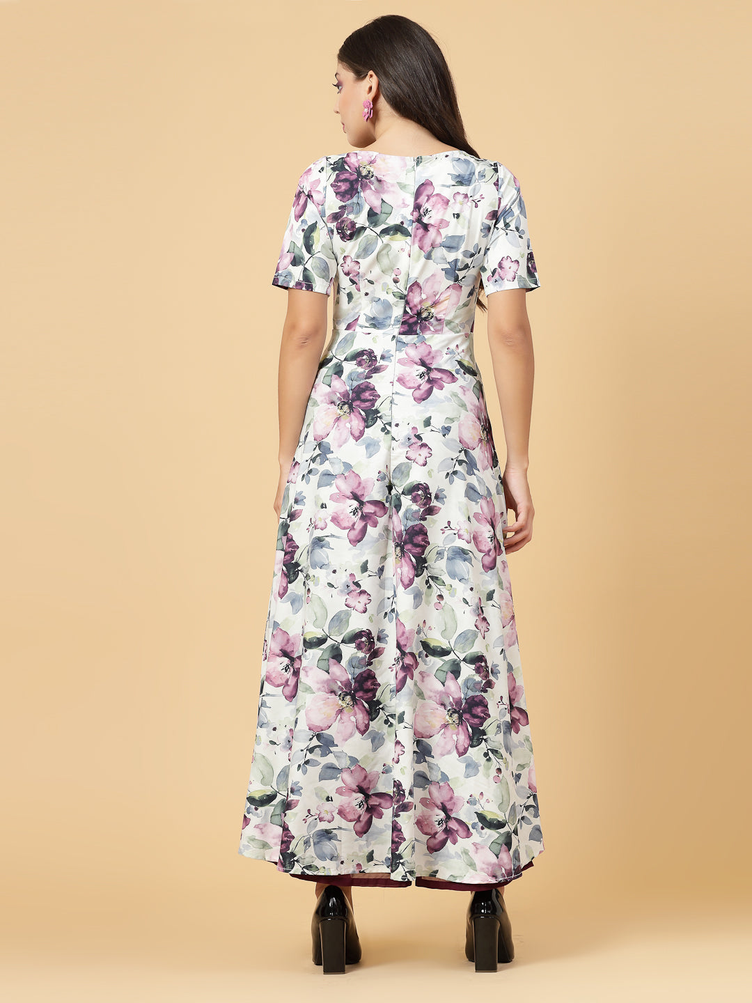 Make a stylish statement by this all time favourite jumpsuit for women, whether its official meetings or family gatherings, this will surly turn heads.  Zip Closure at Back | Fabric Crepe | Lining attached