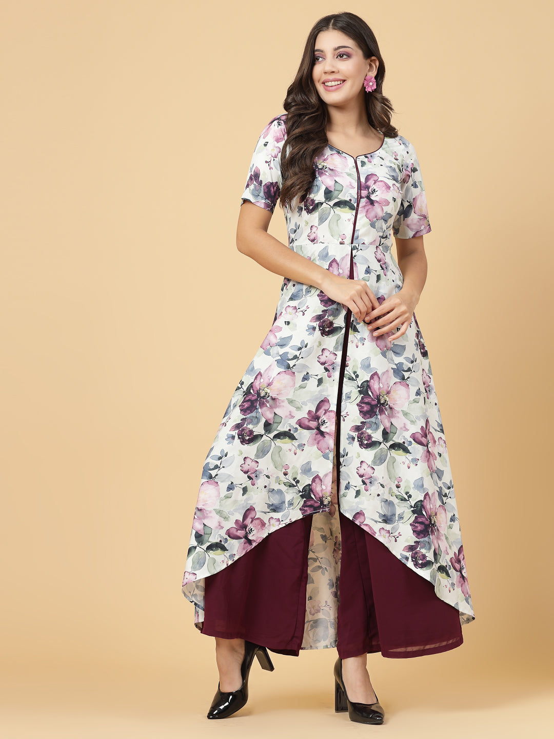 Make a stylish statement by this all time favourite jumpsuit for women, whether its official meetings or family gatherings, this will surly turn heads.  Zip Closure at Back | Fabric Crepe | Lining attached