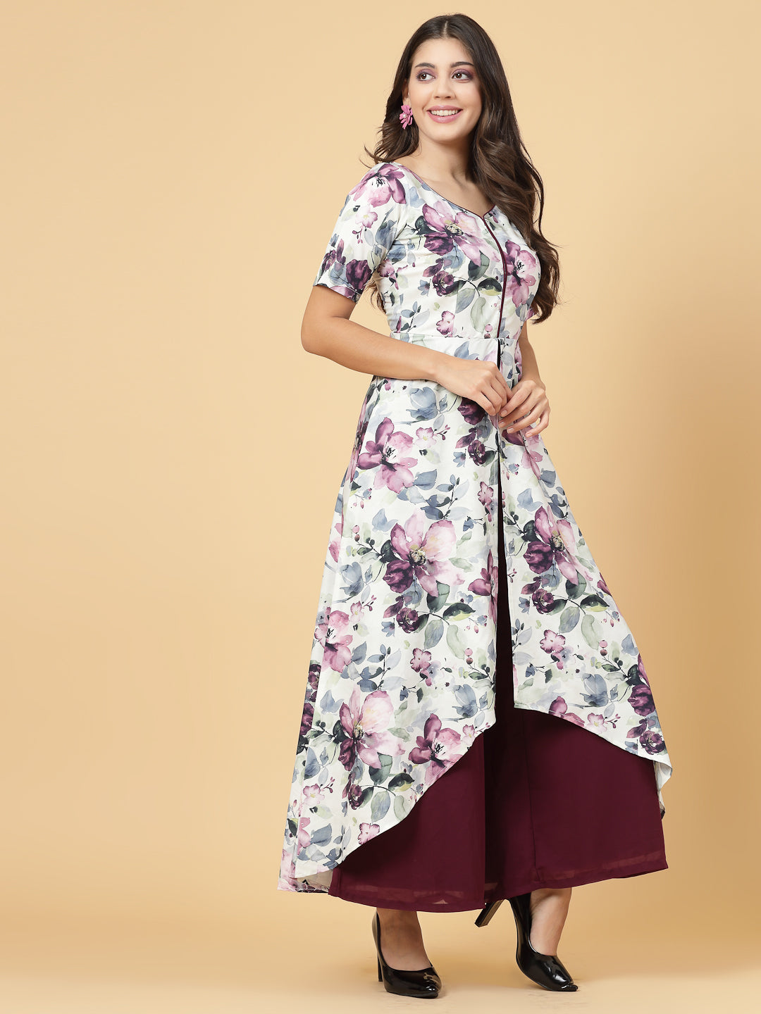 Make a stylish statement by this all time favourite jumpsuit for women, whether its official meetings or family gatherings, this will surly turn heads.  Zip Closure at Back | Fabric Crepe | Lining attached