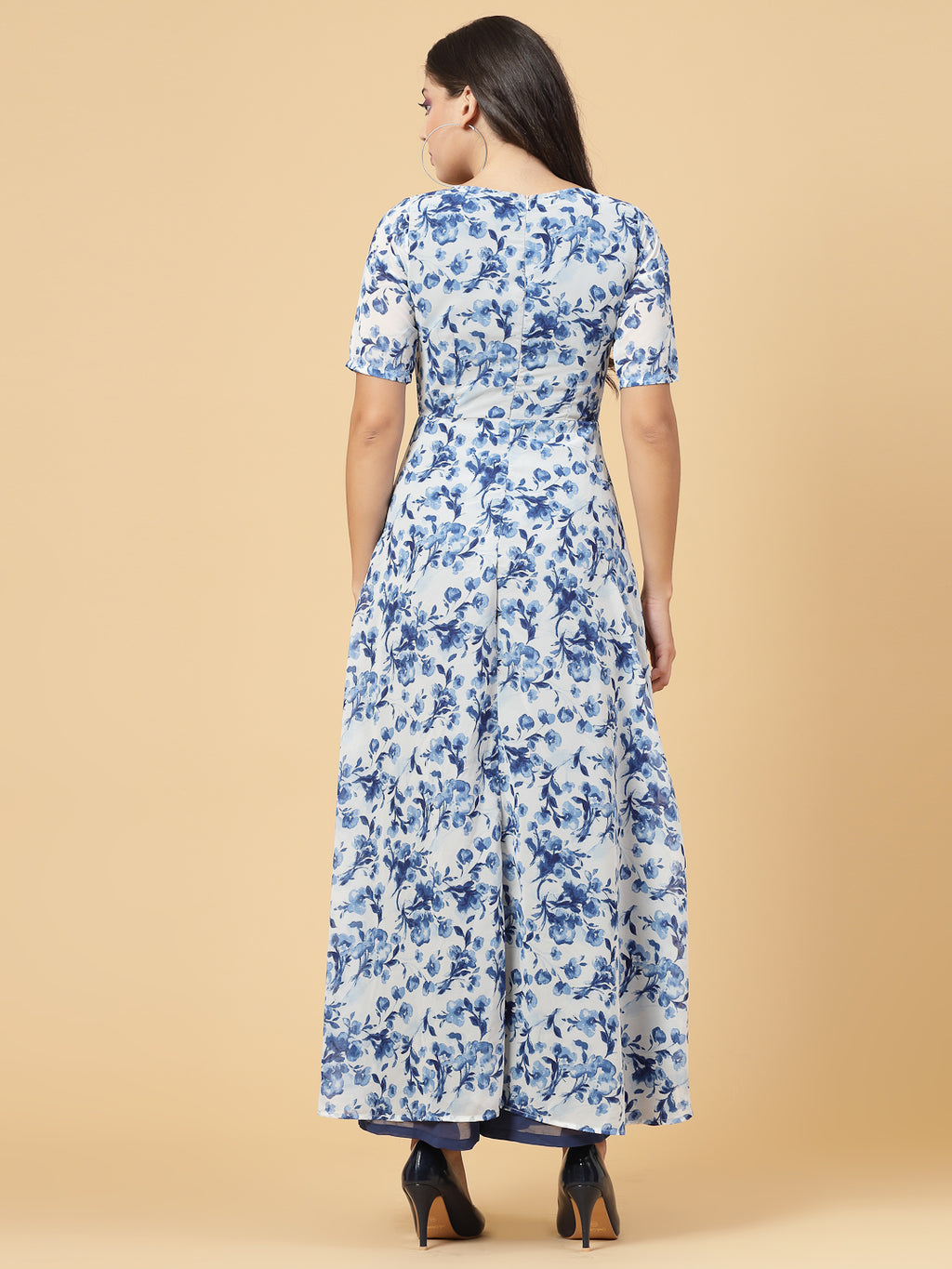 Make a stylish statement by this all time favourite jumpsuit for women, whether its official meetings or family gatherings, this will surly turn heads.  Zip Closure at Back | Fabric Crepe | Lining attached