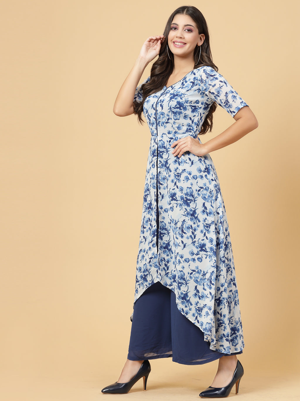 Make a stylish statement by this all time favourite jumpsuit for women, whether its official meetings or family gatherings, this will surly turn heads.  Zip Closure at Back | Fabric Crepe | Lining attached