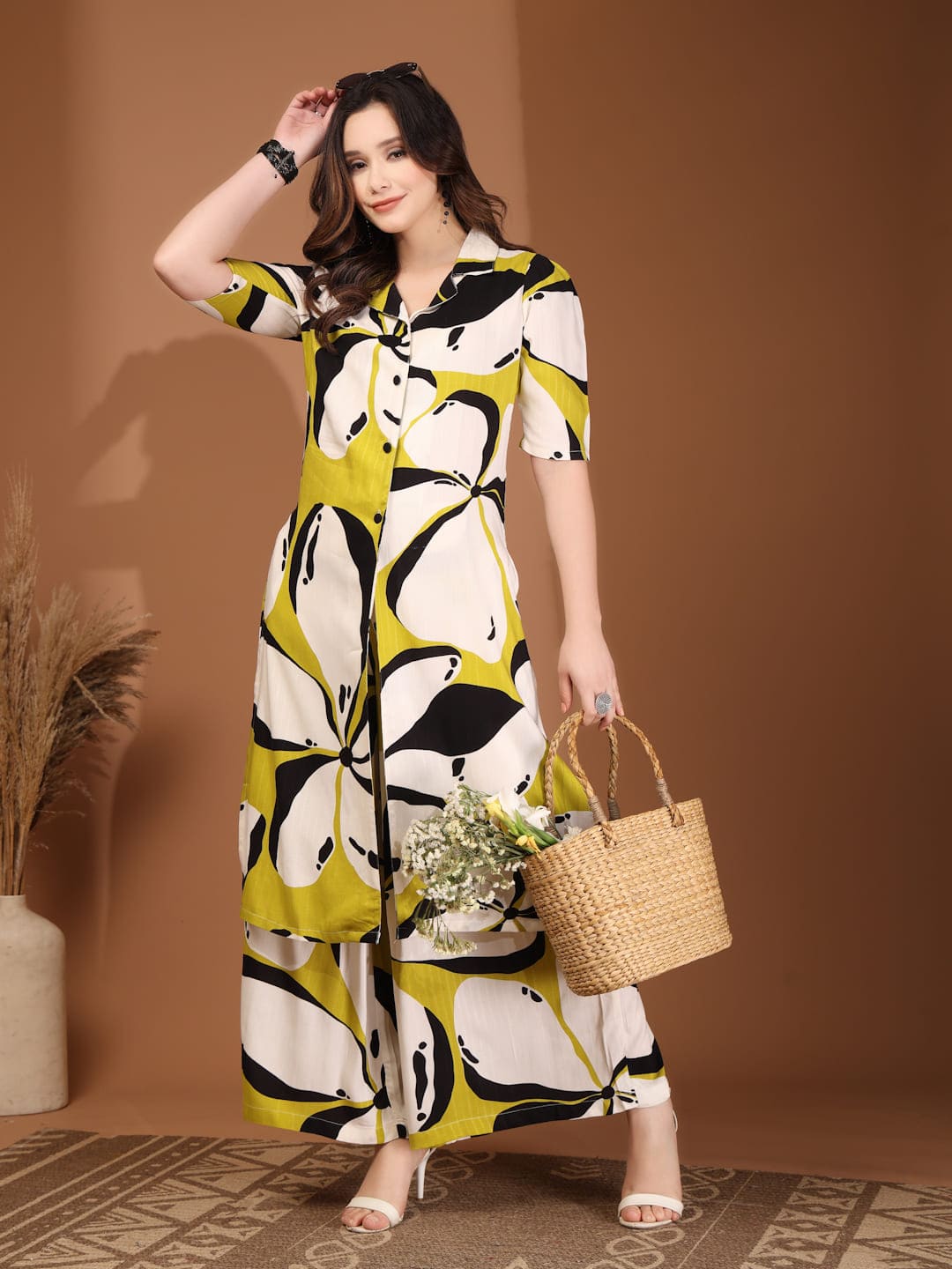 Woman wearing RAASSIO lime green abstract printed 100% viscose front slit kurta set with palazzo pants styling image