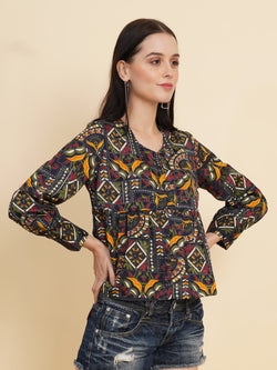  A vibrant and stylish women's top with a multi-color ethnic print. The top features full sleeves and is made with high-quality fabric. The print consists of various intricate patterns and colors, creating a visually appealing and unique design. The top is suitable for casual or semi-formal occasions, adding a touch of cultural flair to any outfit