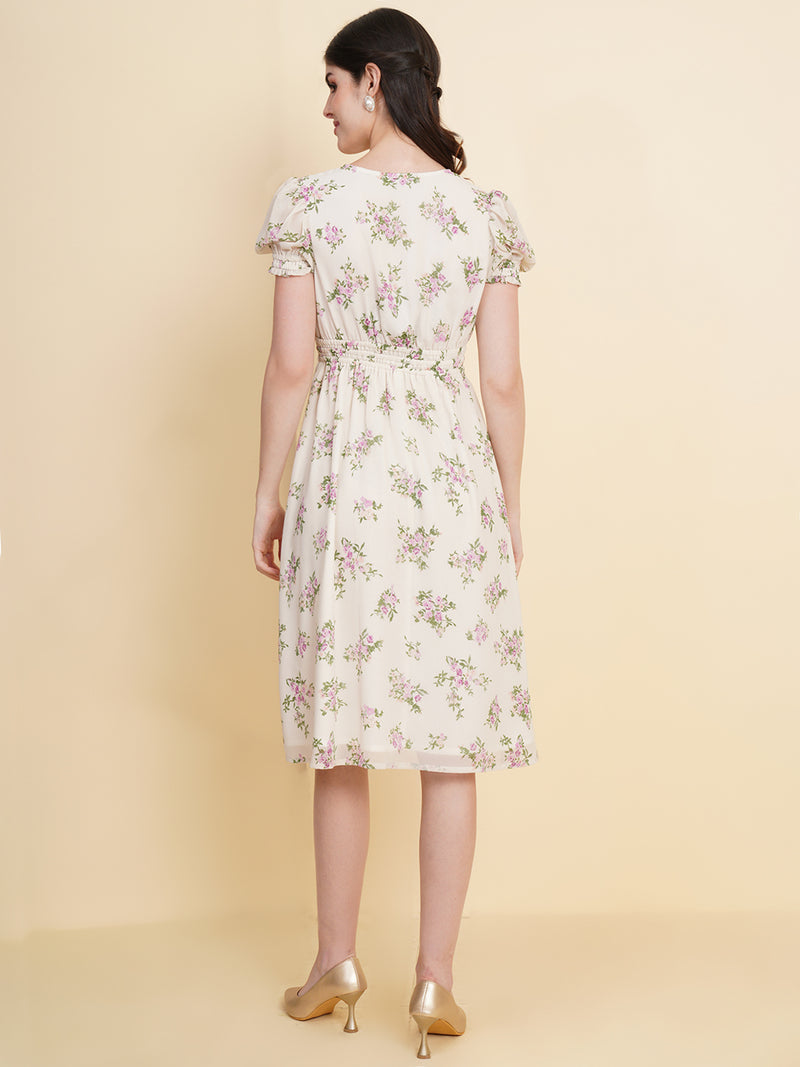 Slay the season in this refreshing cream print ruched waist dress for women. Tailored in a flowy silhouette, the dress features a floral print with attached lining and ruched detail on the waist.  Style Tip: Enhance your look with strappy sandals and a white sling bag.