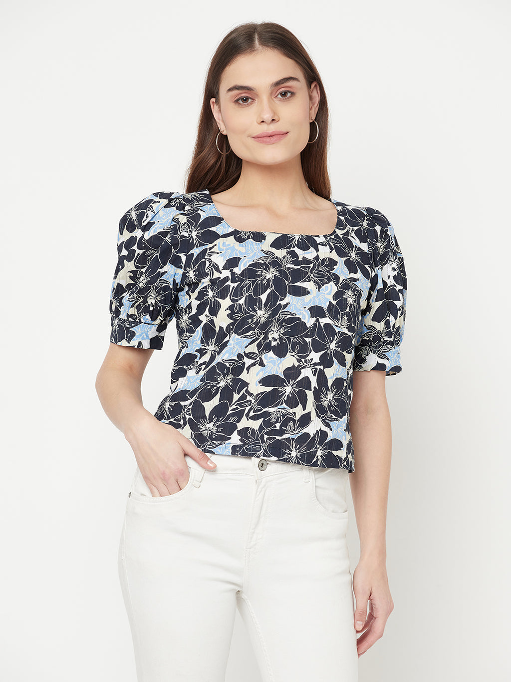 A Blue Color Floral Printed Cotton Top for Women is a comfortable and stylish piece of clothing that is perfect for a casual day out or a summer day. The top is made of soft and breathable cotton fabric that ensures maximum comfort throughout the day.