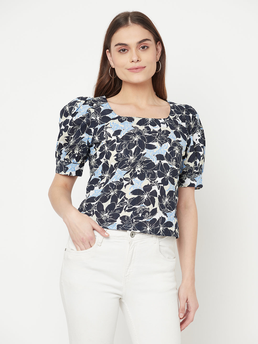 A Blue Color Floral Printed Cotton Top for Women is a comfortable and stylish piece of clothing that is perfect for a casual day out or a summer day. The top is made of soft and breathable cotton fabric that ensures maximum comfort throughout the day.