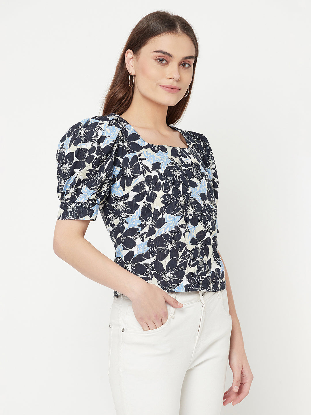 A Blue Color Floral Printed Cotton Top for Women is a comfortable and stylish piece of clothing that is perfect for a casual day out or a summer day. The top is made of soft and breathable cotton fabric that ensures maximum comfort throughout the day.