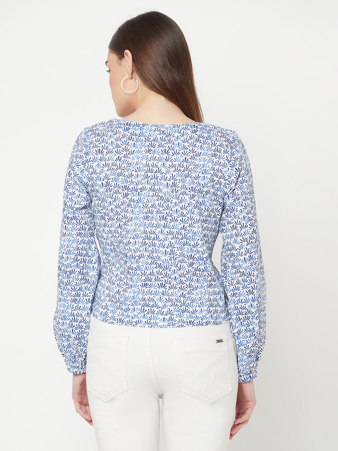 A Cotton Printed Top with Full Sleeve and Keyhole Neck is a comfortable and stylish choice for casual or semi-formal occasions. The top is made of breathable cotton material, which makes it perfect for all-day wear. The printed design adds a pop of color and pattern to the top, making it easy to pair with various bottoms.