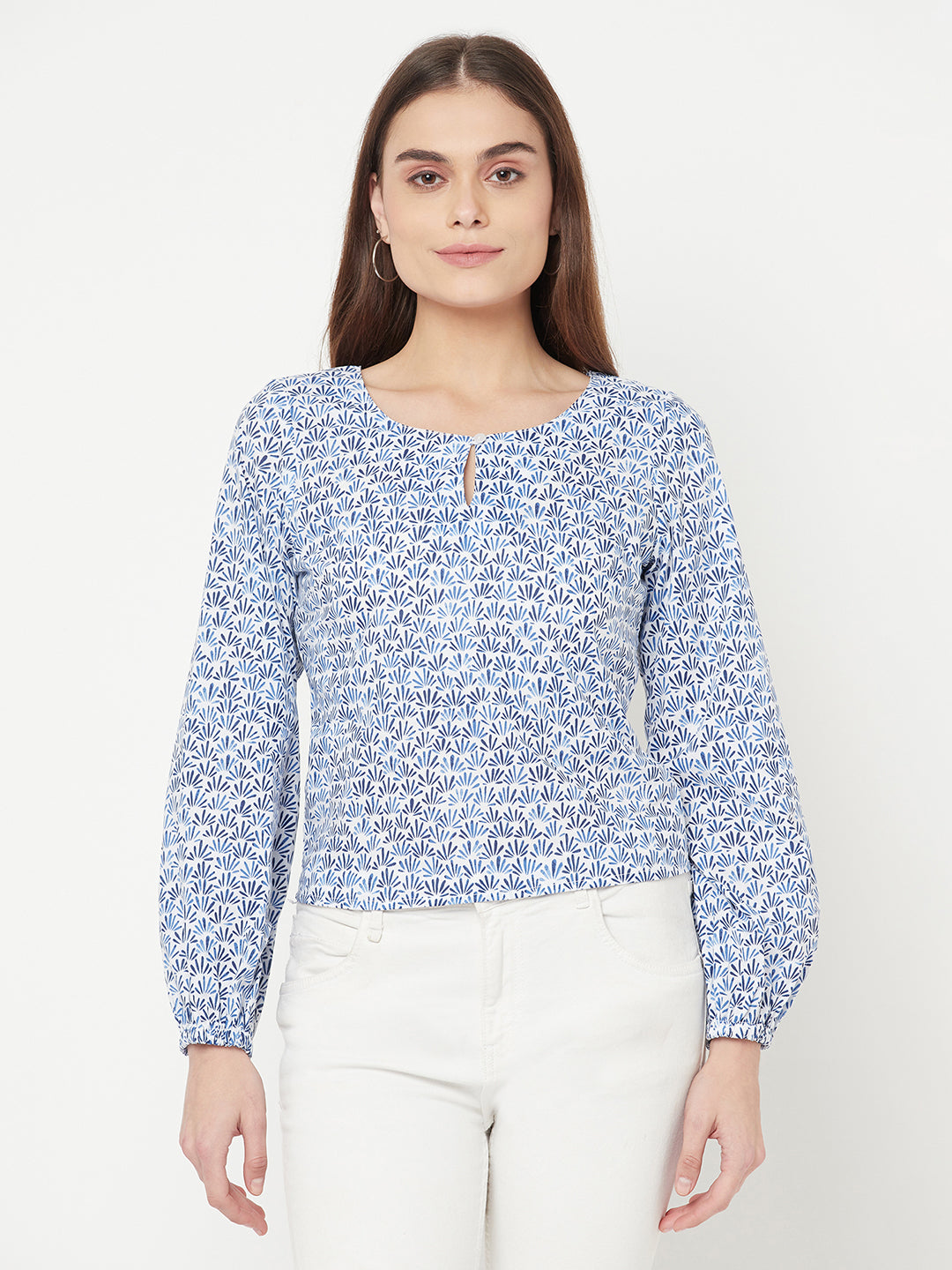 A Cotton Printed Top with Full Sleeve and Keyhole Neck is a comfortable and stylish choice for casual or semi-formal occasions. The top is made of breathable cotton material, which makes it perfect for all-day wear. The printed design adds a pop of color and pattern to the top, making it easy to pair with various bottoms.