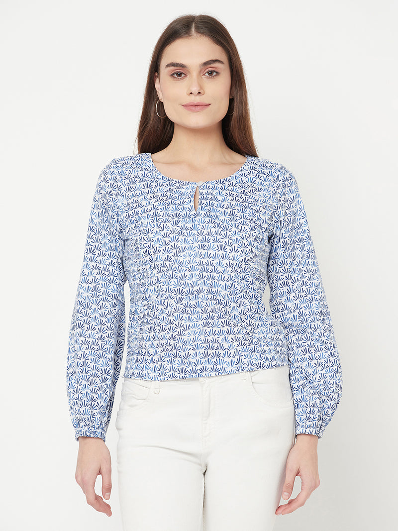 A Cotton Printed Top with Full Sleeve and Keyhole Neck is a comfortable and stylish choice for casual or semi-formal occasions. The top is made of breathable cotton material, which makes it perfect for all-day wear. The printed design adds a pop of color and pattern to the top, making it easy to pair with various bottoms.