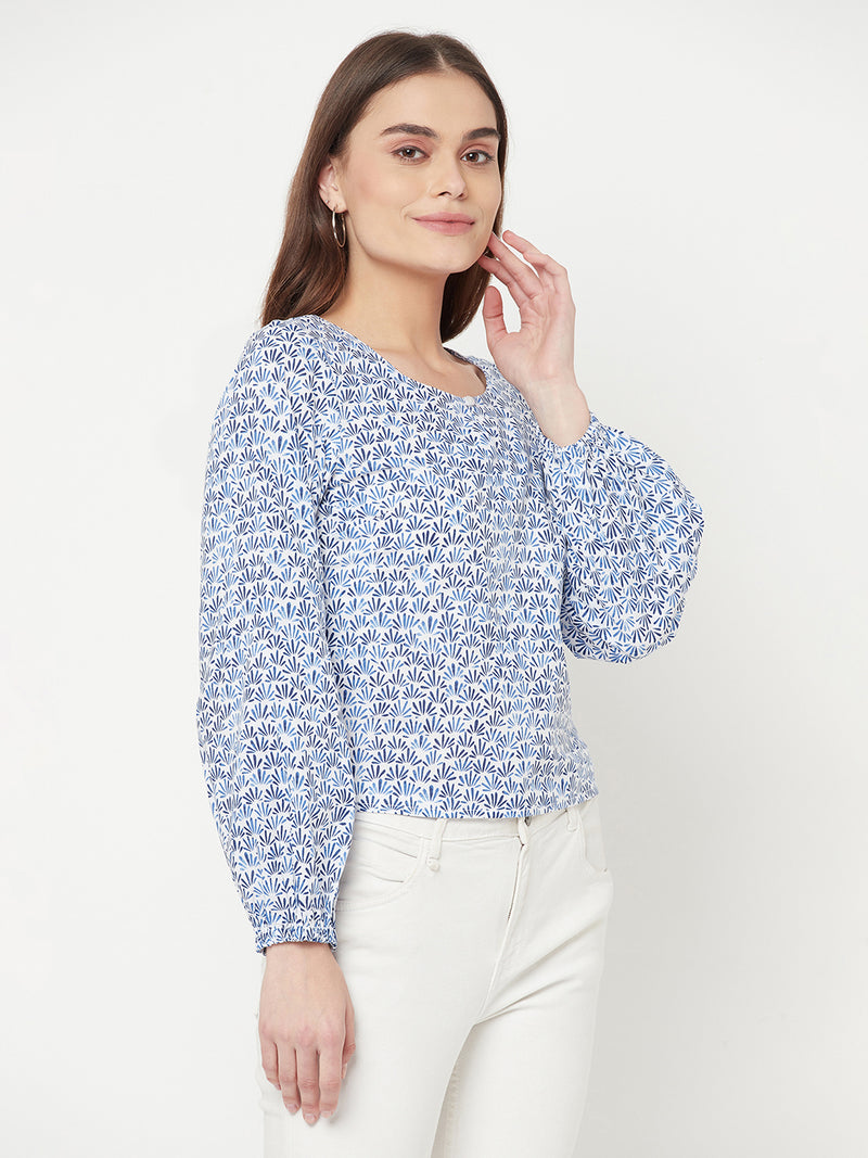 A Cotton Printed Top with Full Sleeve and Keyhole Neck is a comfortable and stylish choice for casual or semi-formal occasions. The top is made of breathable cotton material, which makes it perfect for all-day wear. The printed design adds a pop of color and pattern to the top, making it easy to pair with various bottoms.