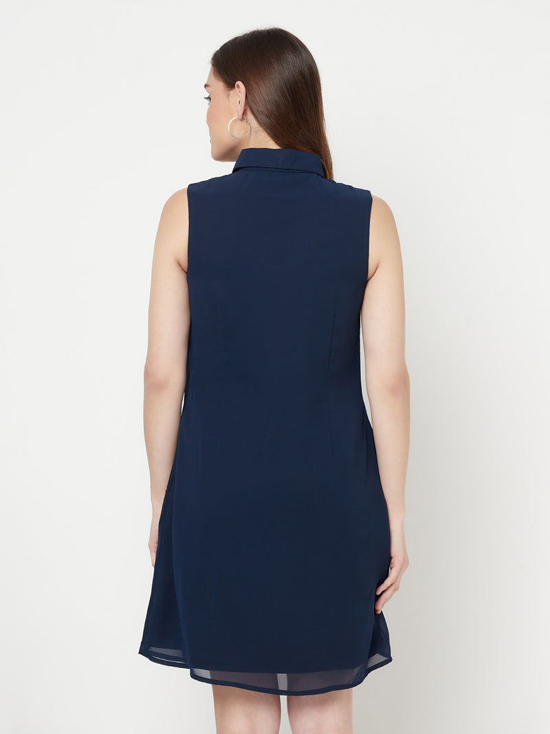 Little Blue Sleeveless Dress With Side Pockets & button Closure at front & attached lining.