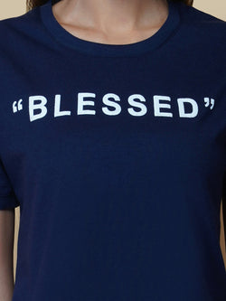 The blue quote T shirt for women in black color is a stylish and comfortable piece of clothing designed for the modern woman. The shirt features a simple yet impactful quote printed in bold white letters on the front. The black color of the shirt is versatile and easy to pair with different outfits, making it a great addition to any wardrobe.
