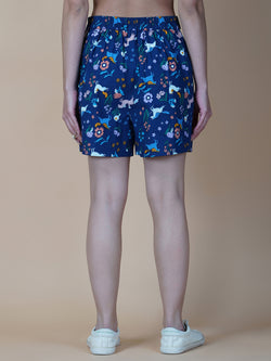 Blue cotton printed shorts for women with side pockets are a perfect addition to your summer wardrobe. These shorts are designed to provide comfort and style during hot weather.  The blue print adds a touch of femininity to the design, making it an ideal choice for those who want to look and feel their best. The shorts come with a side pocket, which is not only functional but also adds a trendy look to the overall design.