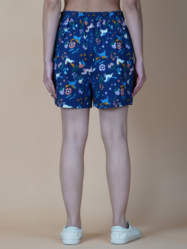 Blue cotton printed shorts for women with side pockets are a perfect addition to your summer wardrobe. These shorts are designed to provide comfort and style during hot weather.  The blue print adds a touch of femininity to the design, making it an ideal choice for those who want to look and feel their best. The shorts come with a side pocket, which is not only functional but also adds a trendy look to the overall design.