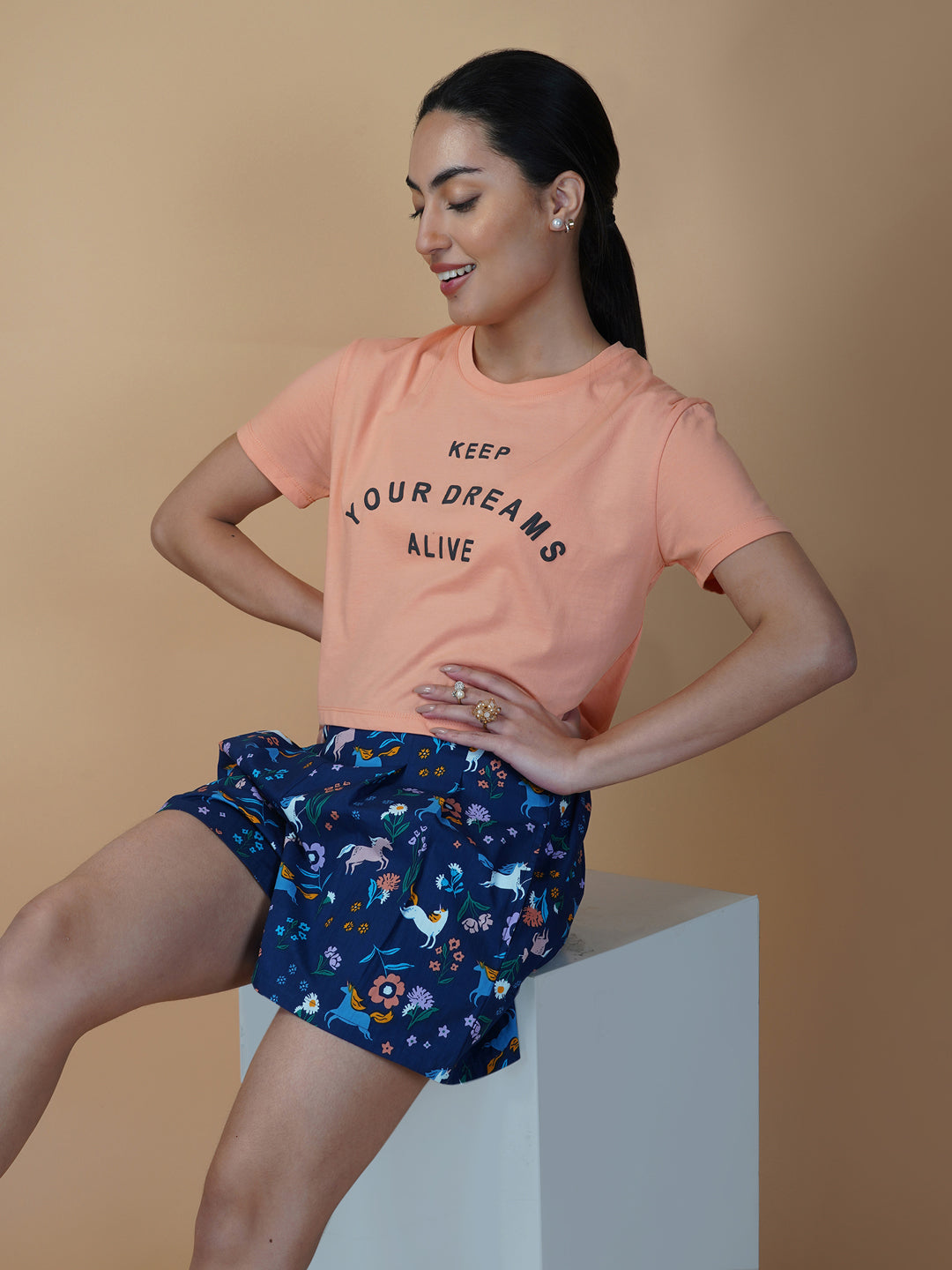 Blue cotton printed shorts for women with side pockets are a perfect addition to your summer wardrobe. These shorts are designed to provide comfort and style during hot weather.  The blue print adds a touch of femininity to the design, making it an ideal choice for those who want to look and feel their best. The shorts come with a side pocket, which is not only functional but also adds a trendy look to the overall design.