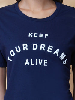The  blue quote T shirt for women in black color is a stylish and comfortable piece of clothing designed for the modern woman. The shirt features a simple yet impactful quote printed in bold white letters on the front. The black color of the shirt is versatile and easy to pair with different outfits, making it a great addition to any wardrobe.