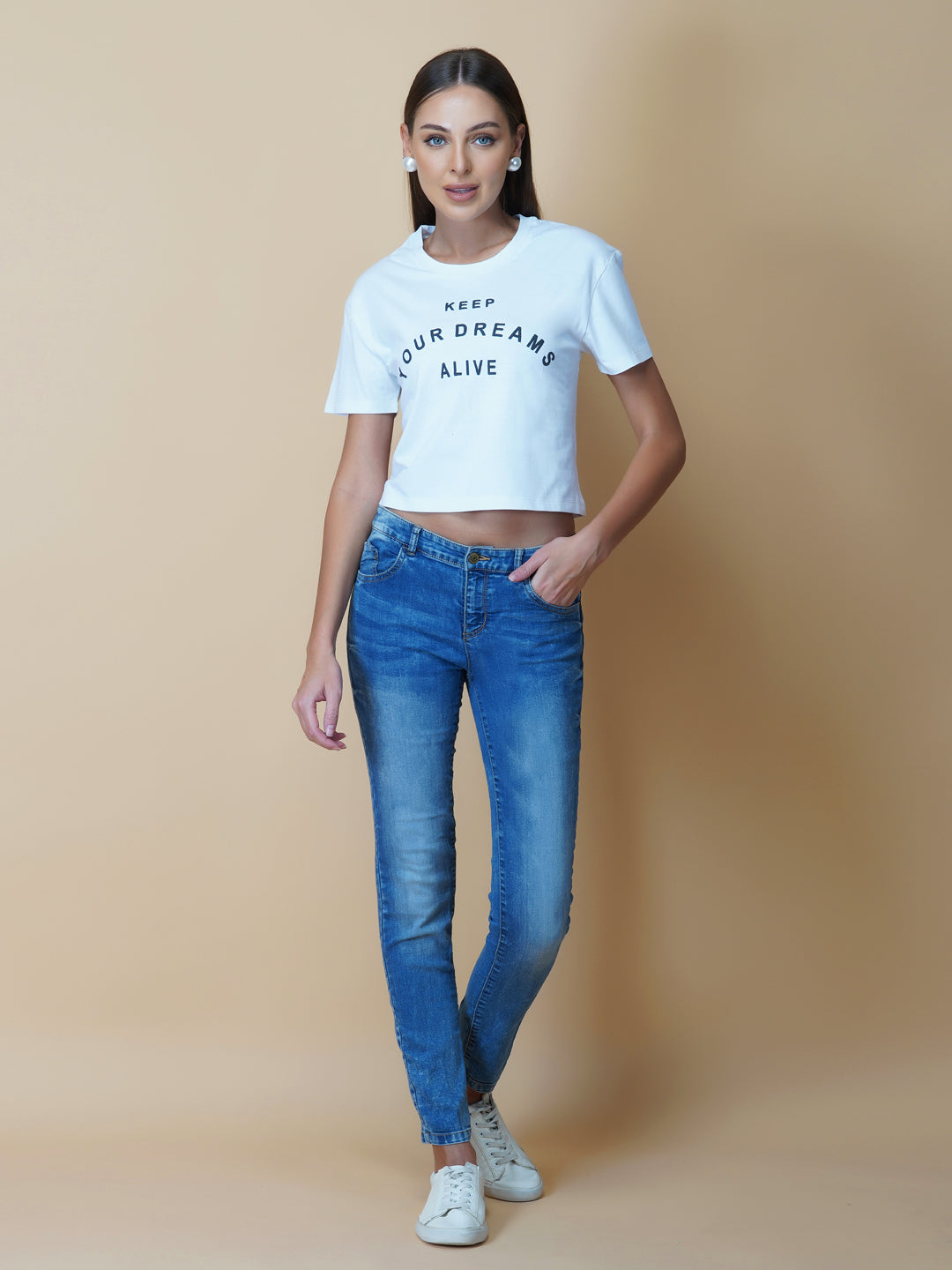 A quote T-shirt for women in white color is the perfect addition to any fashion-conscious woman's wardrobe. Made from soft and comfortable fabric, this T-shirt is designed to provide a relaxed fit and a comfortable feel. The white color of the shirt makes you stand out, and is an ideal choice for those who love to express their femininity peacefully yet stylish way.