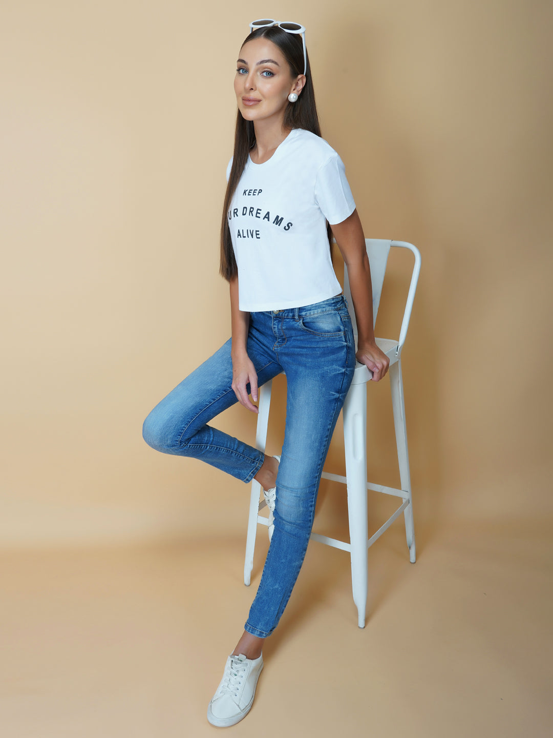 A quote T-shirt for women in white color is the perfect addition to any fashion-conscious woman's wardrobe. Made from soft and comfortable fabric, this T-shirt is designed to provide a relaxed fit and a comfortable feel. The white color of the shirt makes you stand out, and is an ideal choice for those who love to express their femininity peacefully yet stylish way.