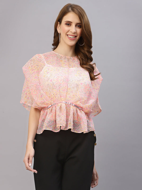 This top features a lightweight and flowy chiffon material that drapes beautifully over the body. The oversized design allows for a comfortable and relaxed fit, while the attached cami provides extra coverage and support. The embellished waist band adds a touch of sparkle and elegance, accentuating the waistline and creating a flattering silhouette. This top is perfect for a variety of occasions, from casual outings to formal events. Pair it with skinny jeans and heels for a chic and stylish look.