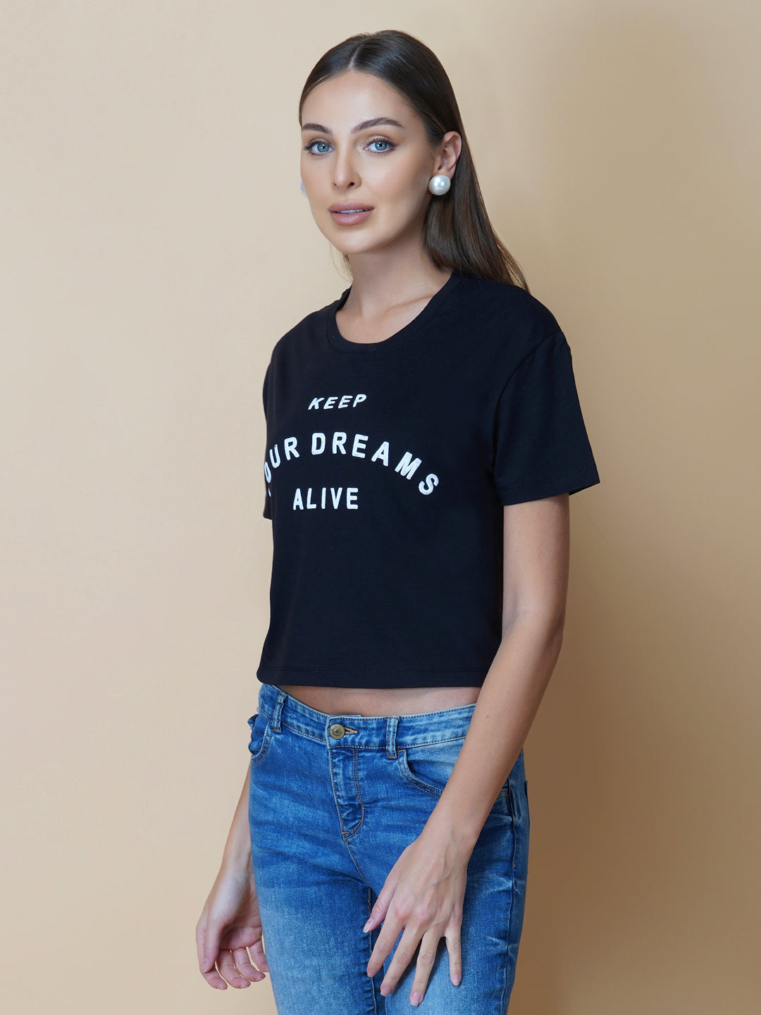 The Quote T shirt for women in black color is a stylish and comfortable piece of clothing designed for the modern woman. The shirt features a simple yet impactful quote printed in bold white letters on the front. The black color of the shirt is versatile and easy to pair with different outfits, making it a great addition to any wardrobe.