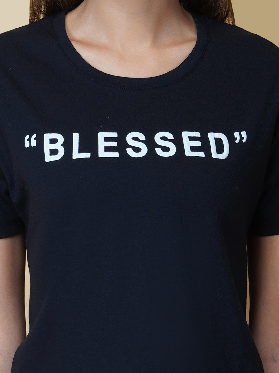 The Quote T shirt for women in black color is a stylish and comfortable piece of clothing designed for the modern woman. The shirt features a simple yet impactful quote printed in bold white letters on the front. The black color of the shirt is versatile and easy to pair with different outfits, making it a great addition to any wardrobe.