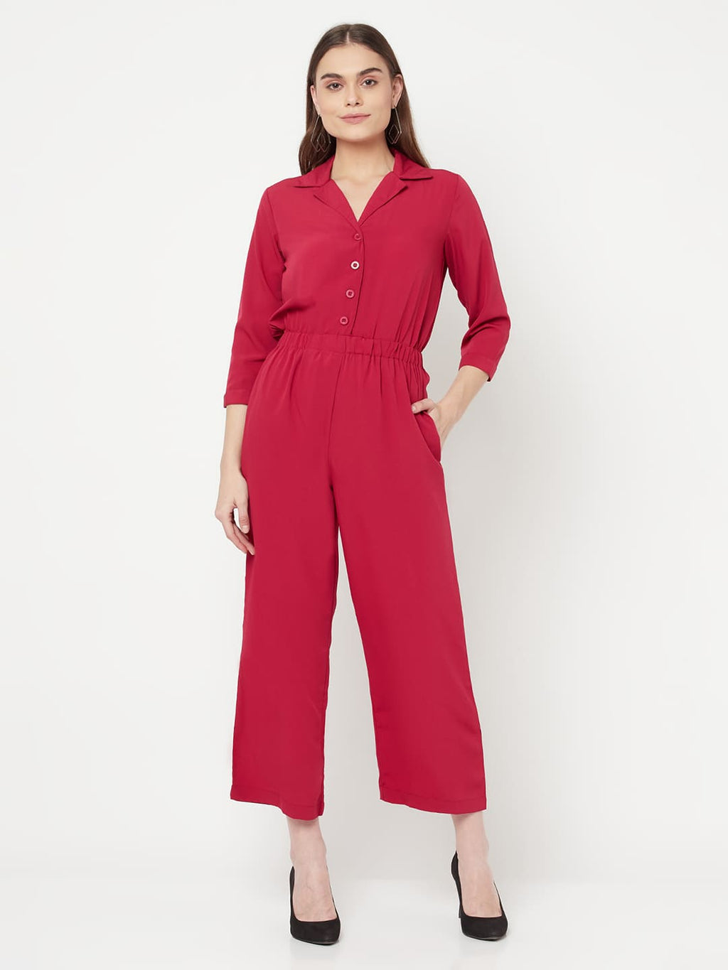 This solid jump suit for women with an elasticated waist is a versatile and stylish piece of clothing that can be dressed up or down for any occasion. It is made of a comfortable and stretchy material that allows for ease of movement, while the elasticated waistband helps to flatter the figure and create a flattering silhouette.