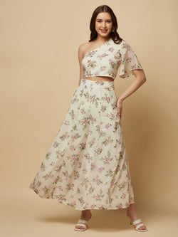 The White Floral Printed Palazzo With One Shoulder Crop Top Co-ords is a stylish and elegant outfit designed for women. This set features a white palazzo pant and a one-shoulder crop top, both adorned with a beautiful floral print in shades of pink, white, and green. The palazzo pants are made of a lightweight and breathable fabric that flows elegantly as you move, providing both comfort and style. 